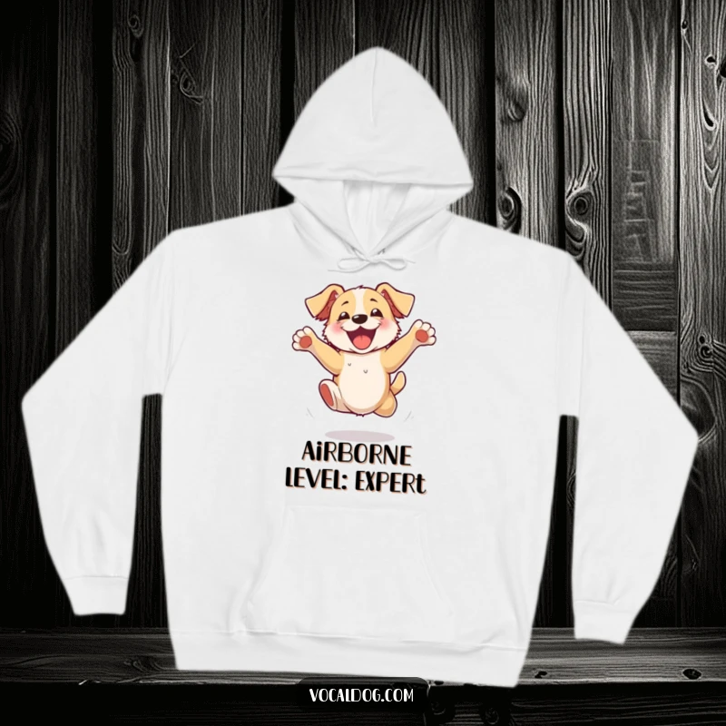 Funny Hoodie showcasing a happy dog jumping with unrestrained excitement, its paws comically flailing, perfect for cozy and humorous wear.